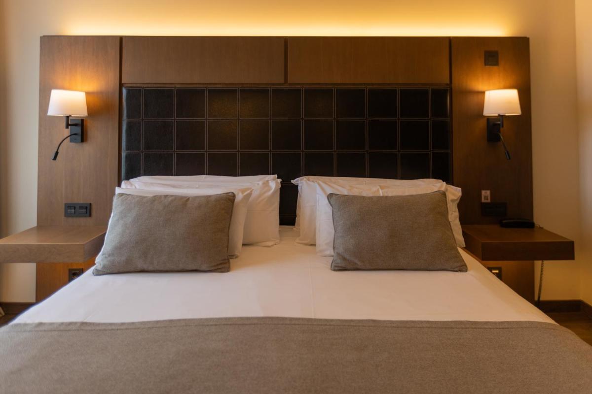 Cama o camas de una habitación en La Piconera Hotel & Spa