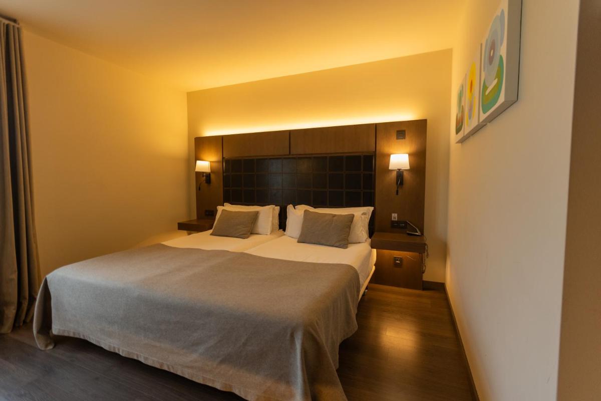 Cama o camas de una habitación en La Piconera Hotel & Spa