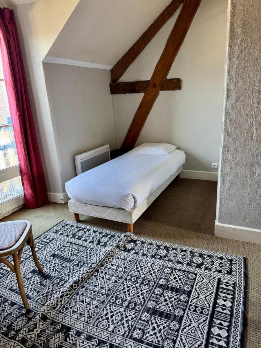 Un ou plusieurs lits dans un hébergement de l'établissement Eco-Domaine La Fontaine - RESIDENCE-SPA - Plage de la Fontaine aux Bretons