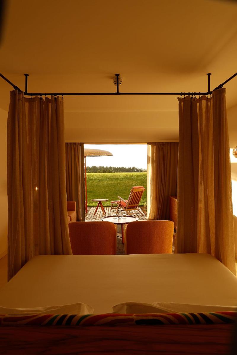 Uma cama ou camas num quarto em Praia do Canal Nature Retreat - Small Luxury Hotels of the World
