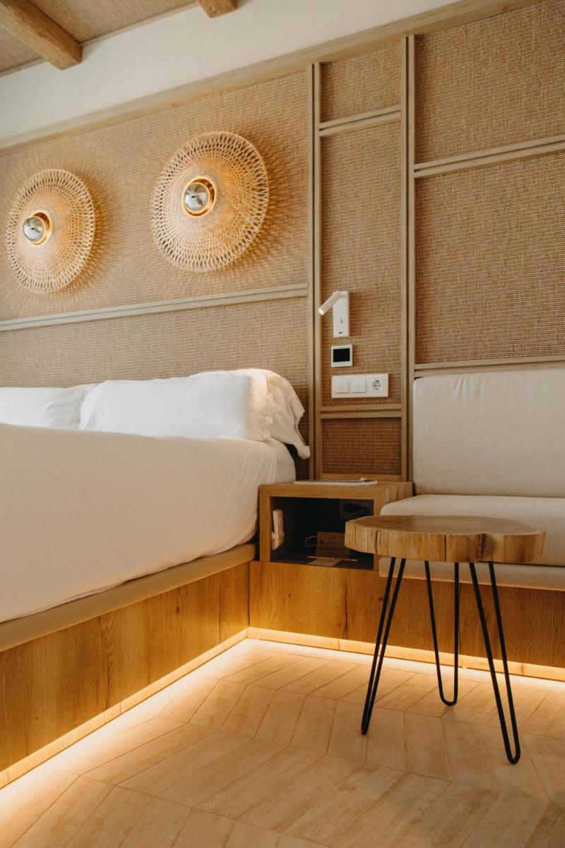Cama o camas de una habitación en Lago Resort Menorca - Suites del Lago Adults Only