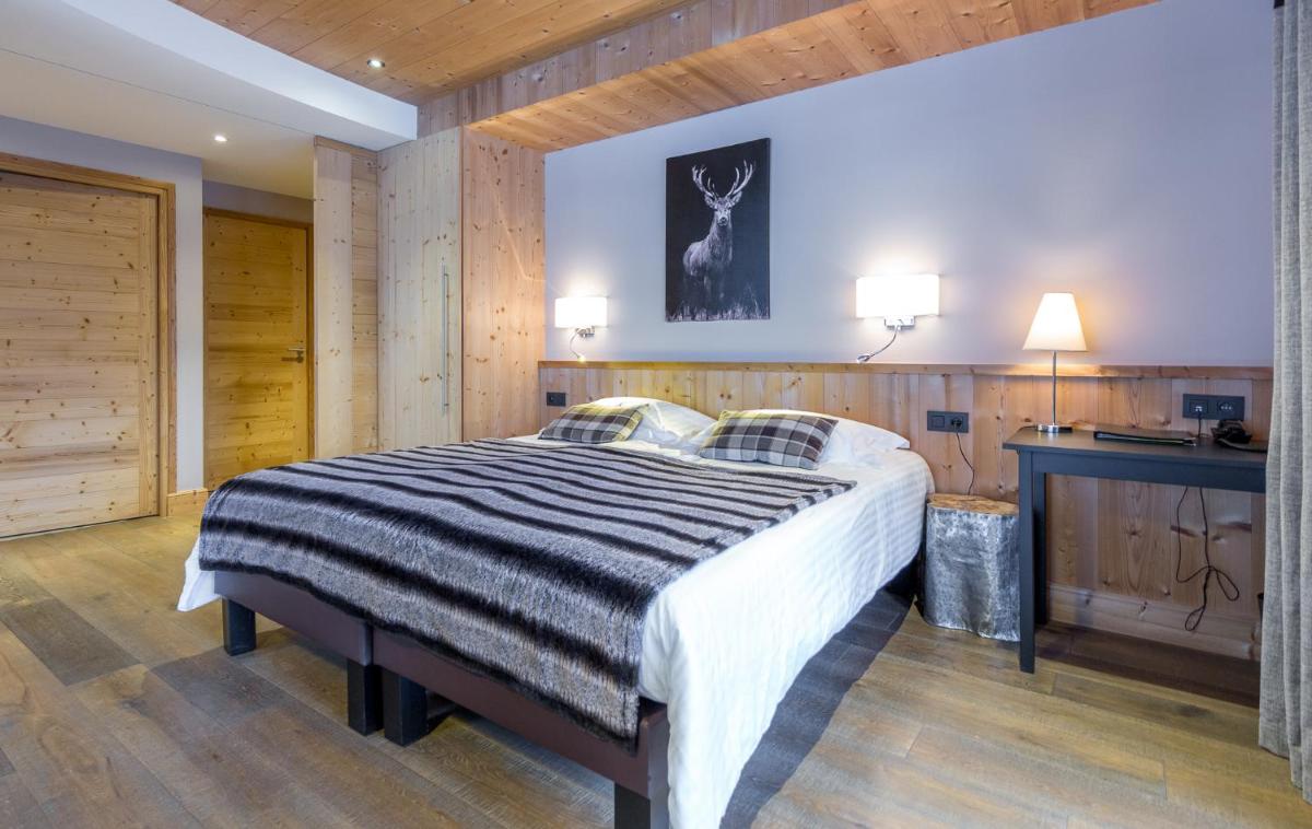 Un ou plusieurs lits dans un hébergement de l'établissement Logis Hotel Gai Soleil