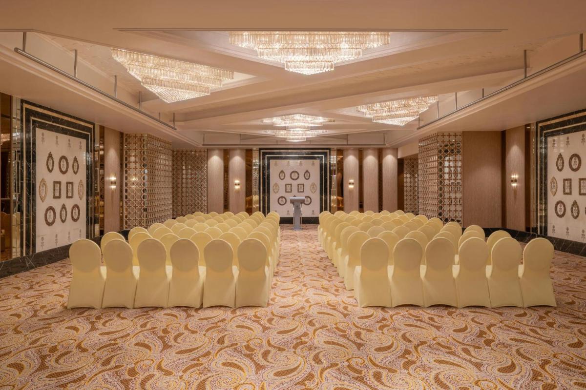 a room with rows of chairs in a ballroom at The St. Regis Mumbai in Mumbai