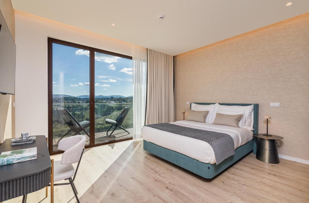 Uma cama ou camas num quarto em Haven Nature Hotel & Villas
