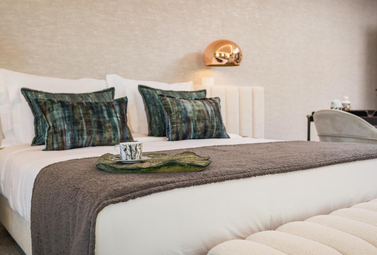 Uma cama ou camas num quarto em Haven Nature Hotel & Villas