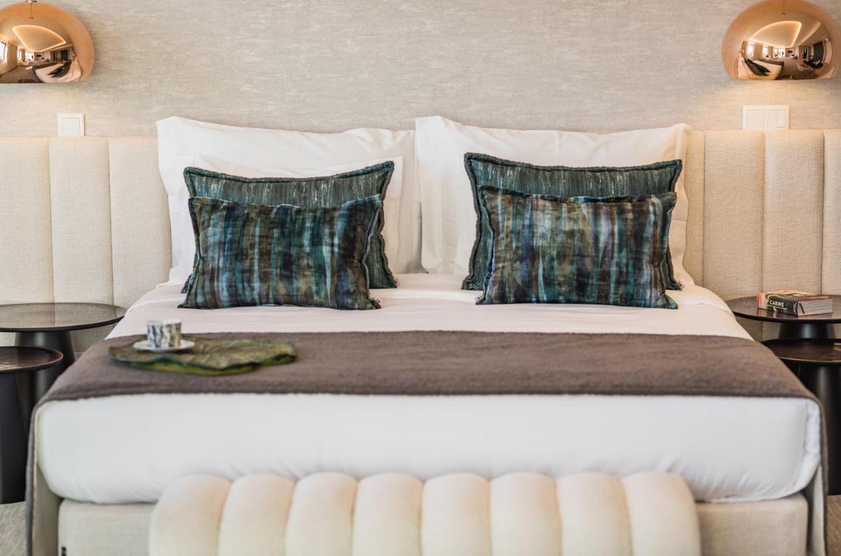 Uma cama ou camas num quarto em Haven Nature Hotel & Villas