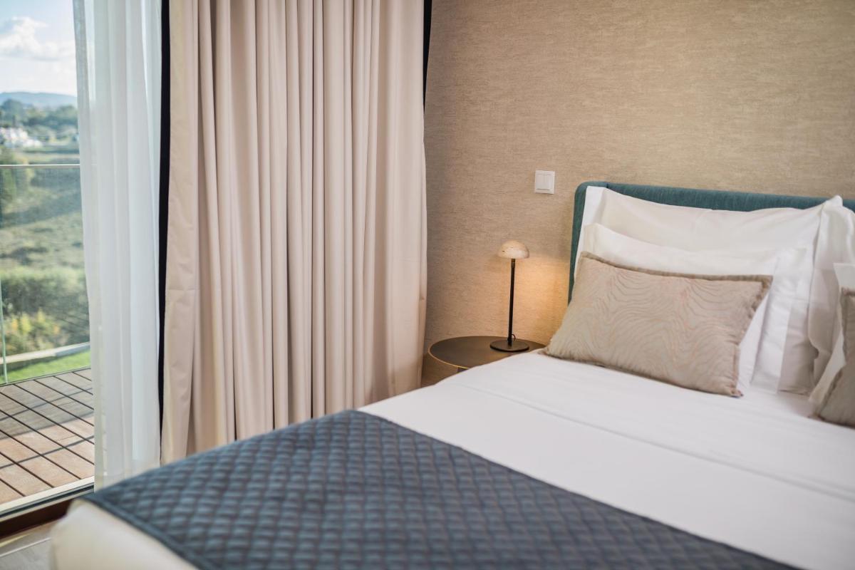 Uma cama ou camas num quarto em Haven Nature Hotel & Villas