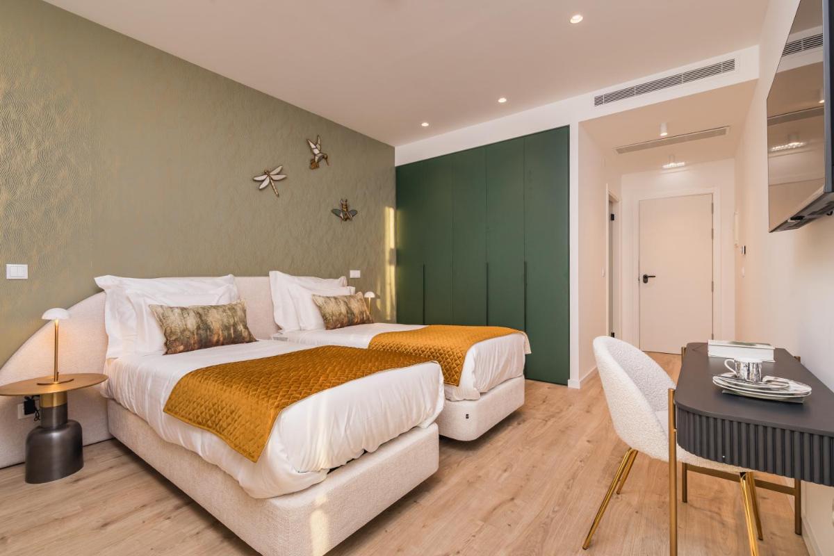 Uma cama ou camas num quarto em Haven Nature Hotel & Villas