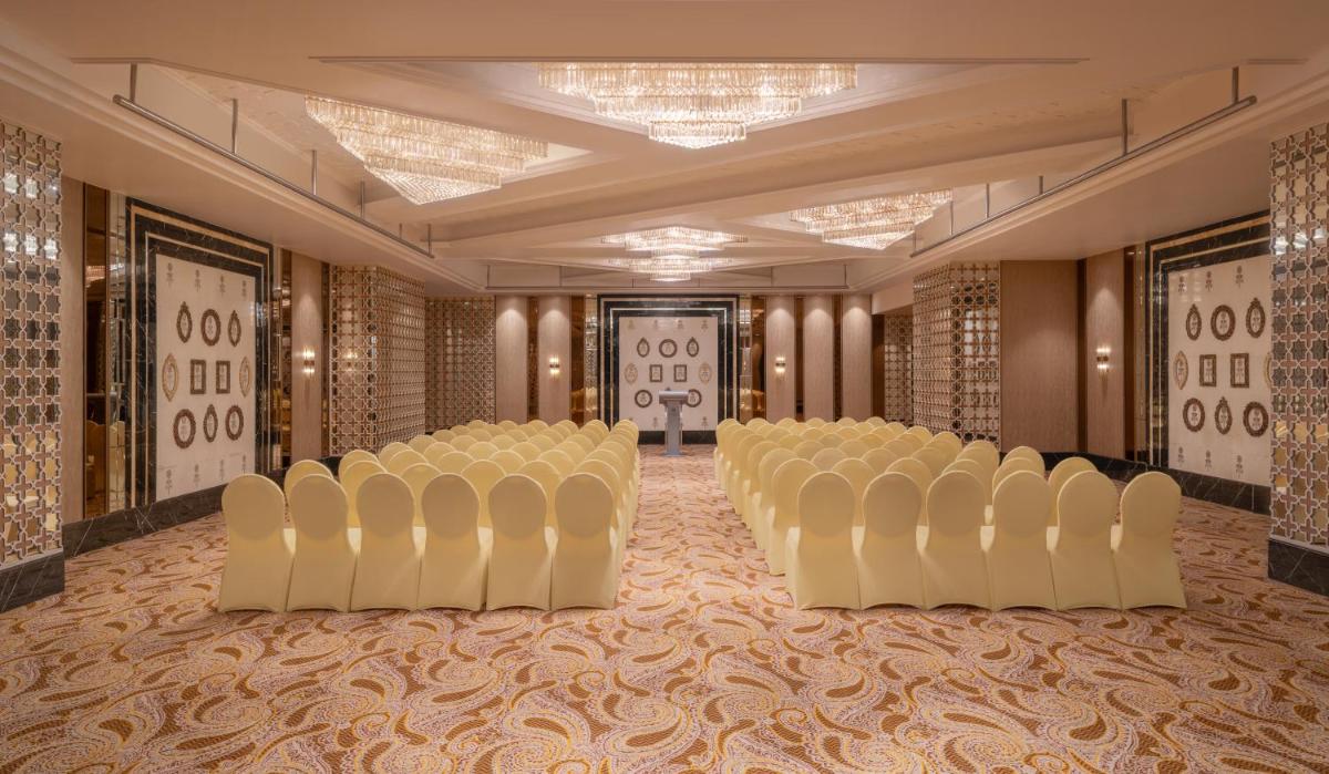 a ballroom with rows of chairs in a room at The St. Regis Mumbai in Mumbai