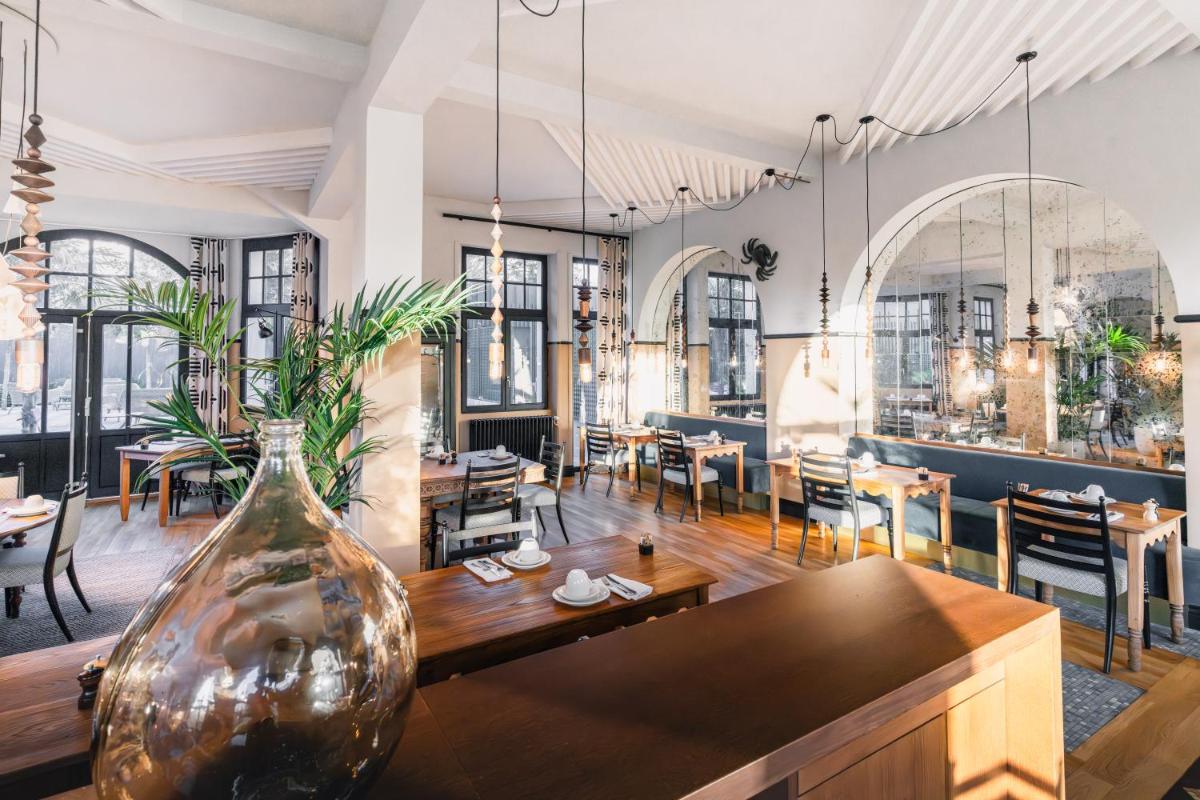 Restaurant ou autre lieu de restauration dans l'établissement Hotel De Diane