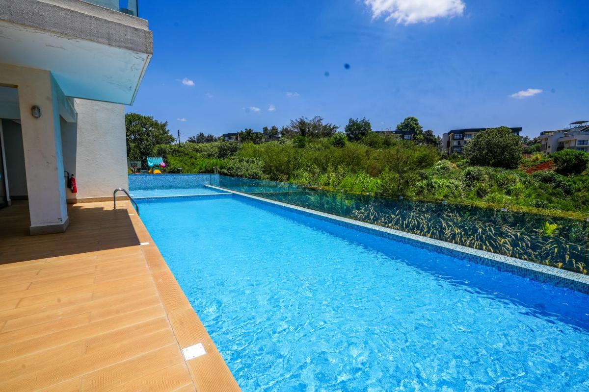 Riverbank One Bedroom Apartment, Swimming pool, gym, workspace, DB Space Living - Housity