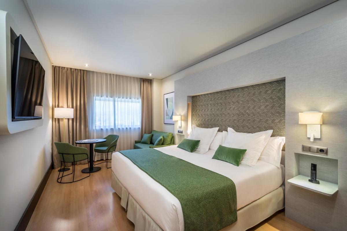 Cama o camas de una habitación en Barceló Granada Congress