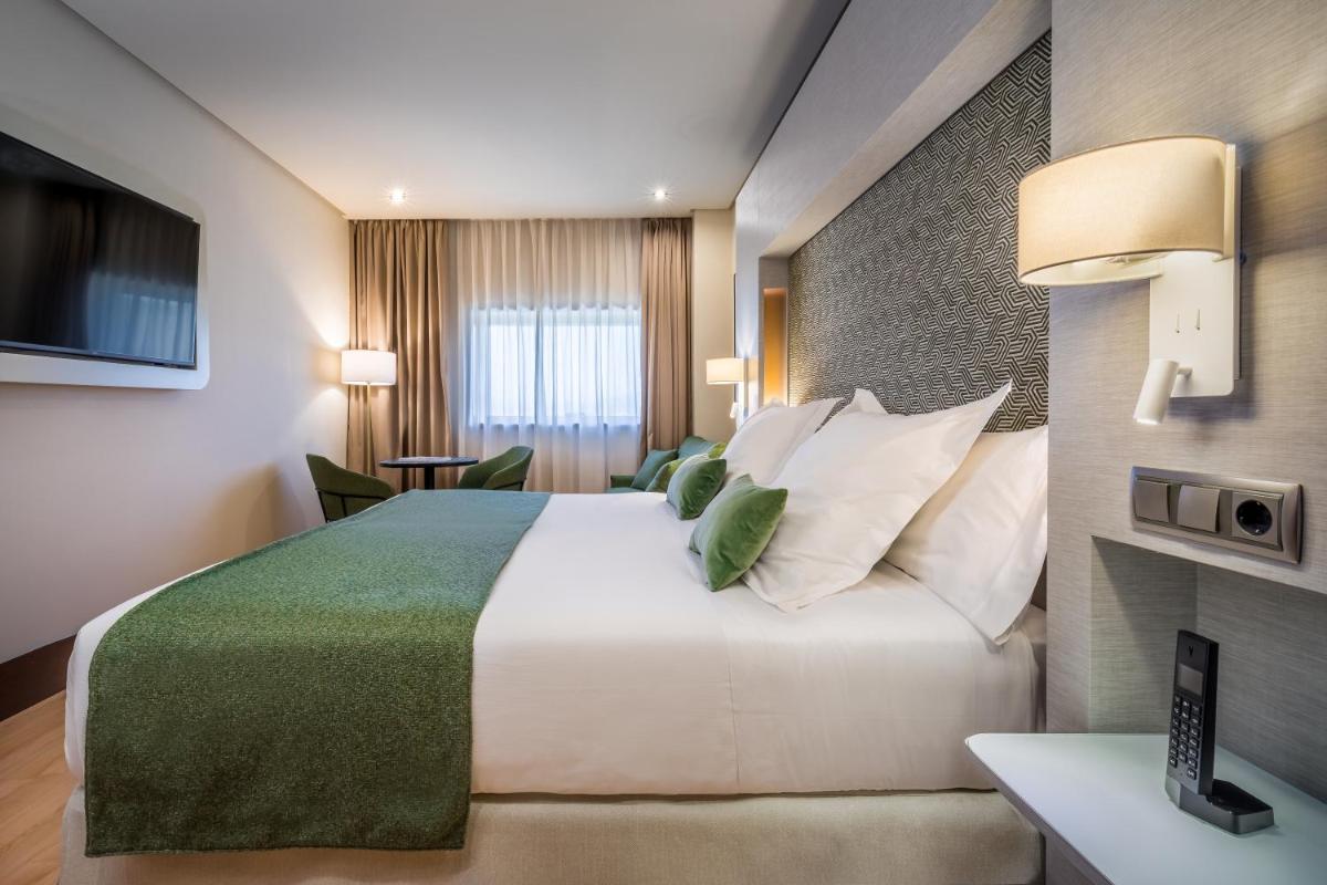 Cama o camas de una habitación en Barceló Granada Congress