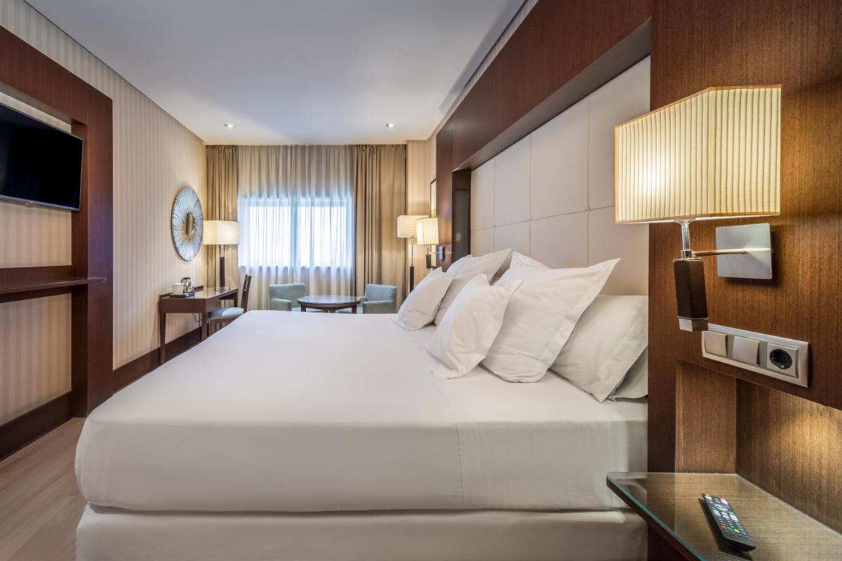 Cama o camas de una habitación en Barceló Granada Congress