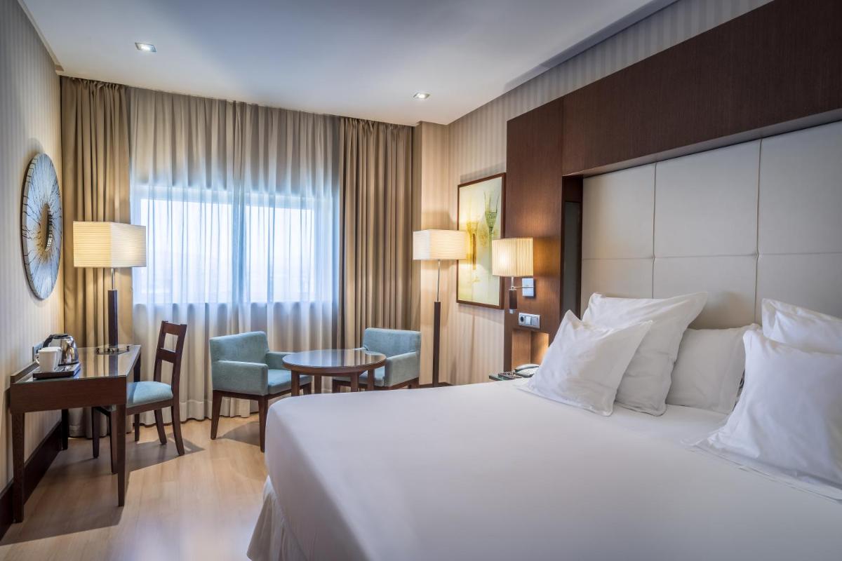 Cama o camas de una habitación en Barceló Granada Congress