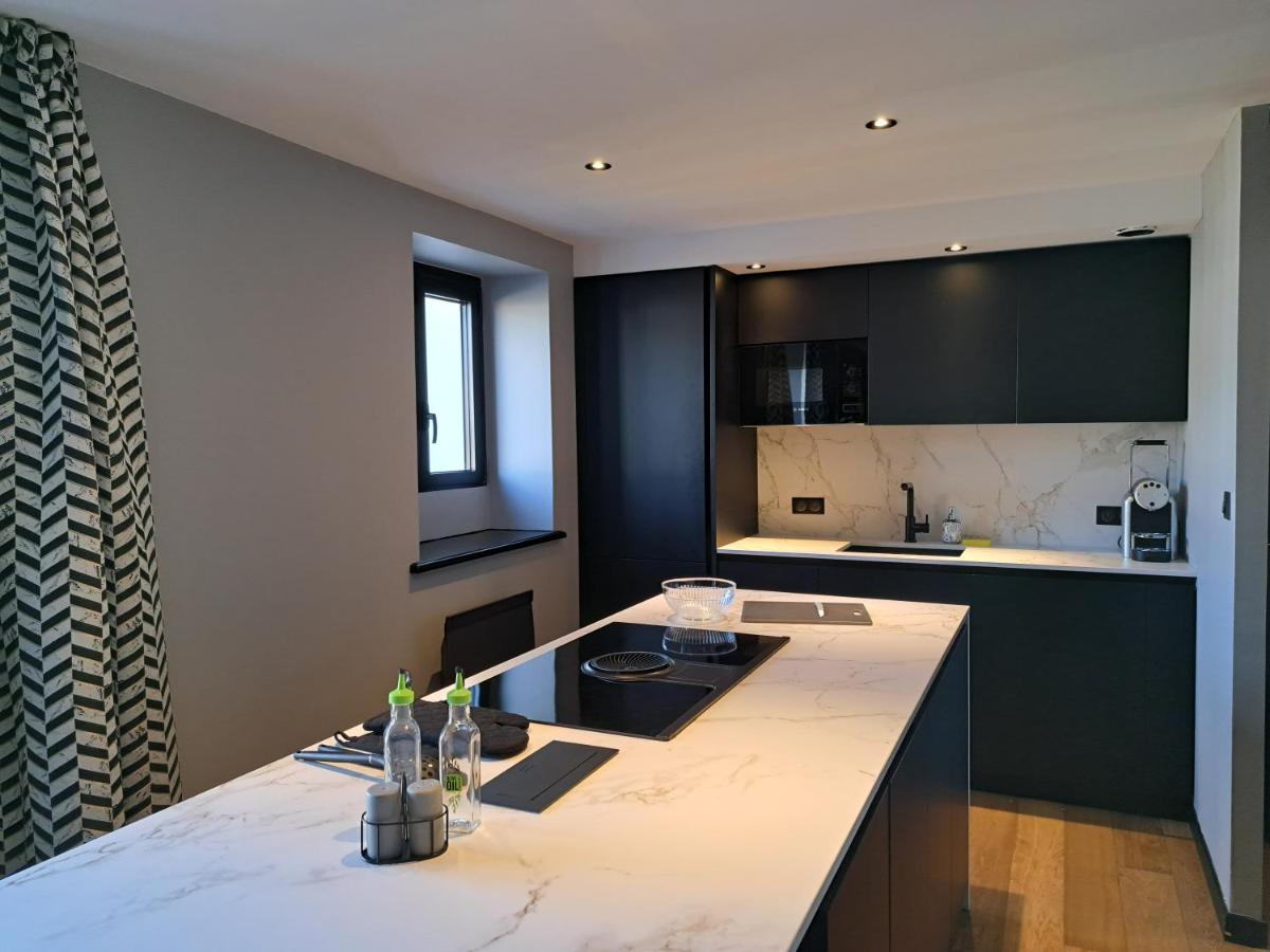 Cuisine ou kitchenette dans l'établissement Brit Hotel Les Voyageurs