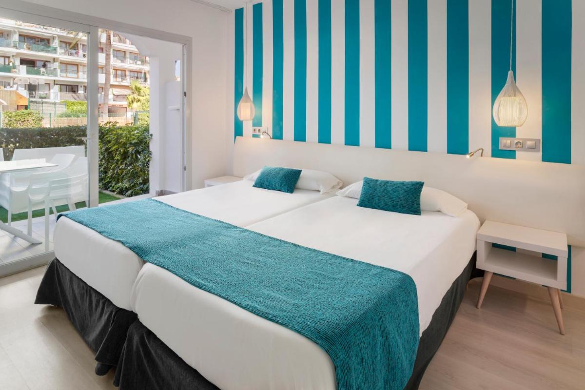 Cama o camas de una habitación en Alcudia Garden Aparthotel