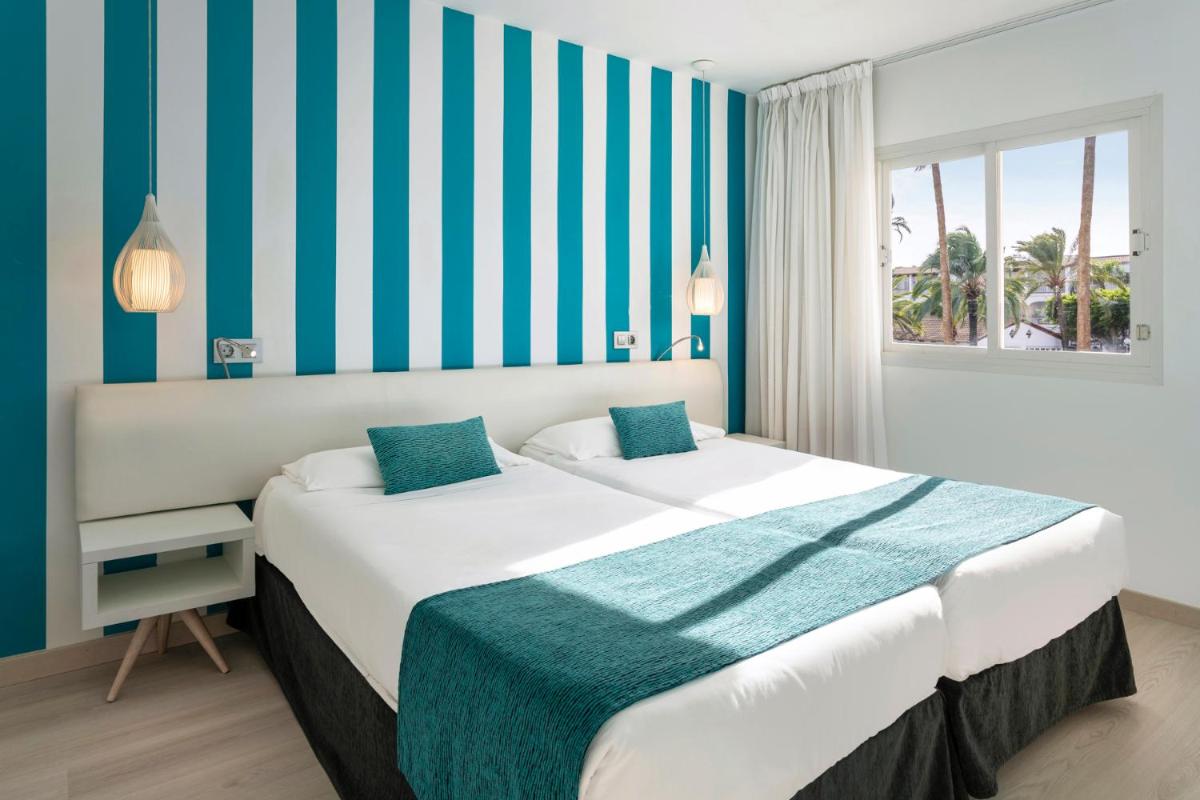 Cama o camas de una habitación en Alcudia Garden Aparthotel