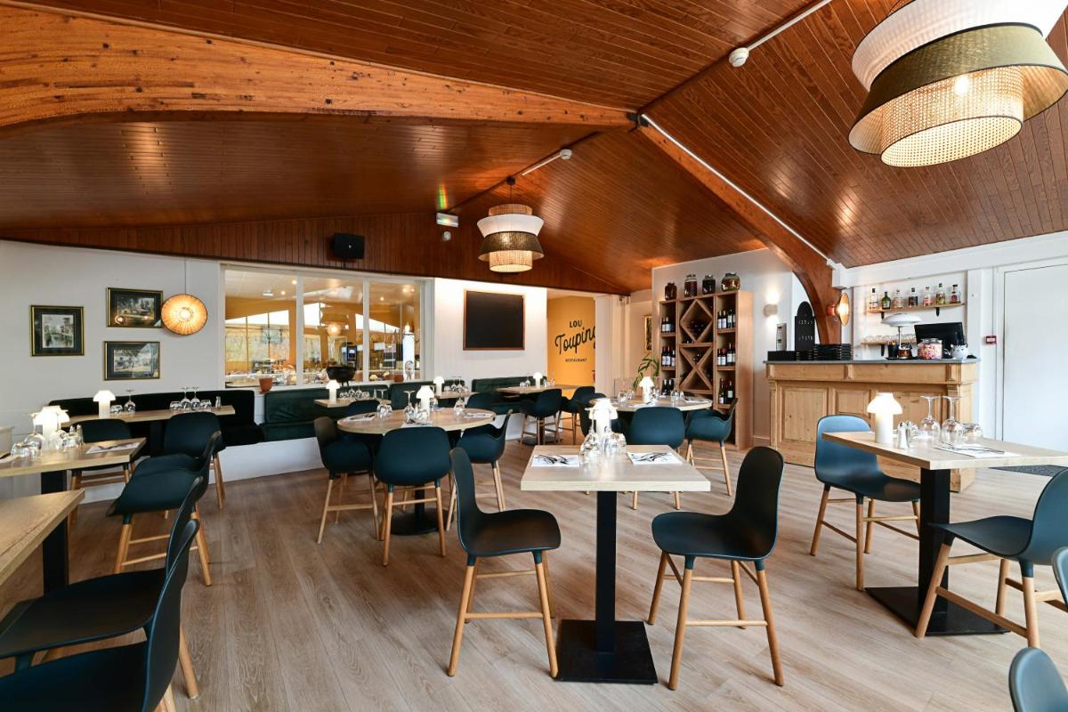 Restaurant ou autre lieu de restauration dans l'établissement Logis Thermal
