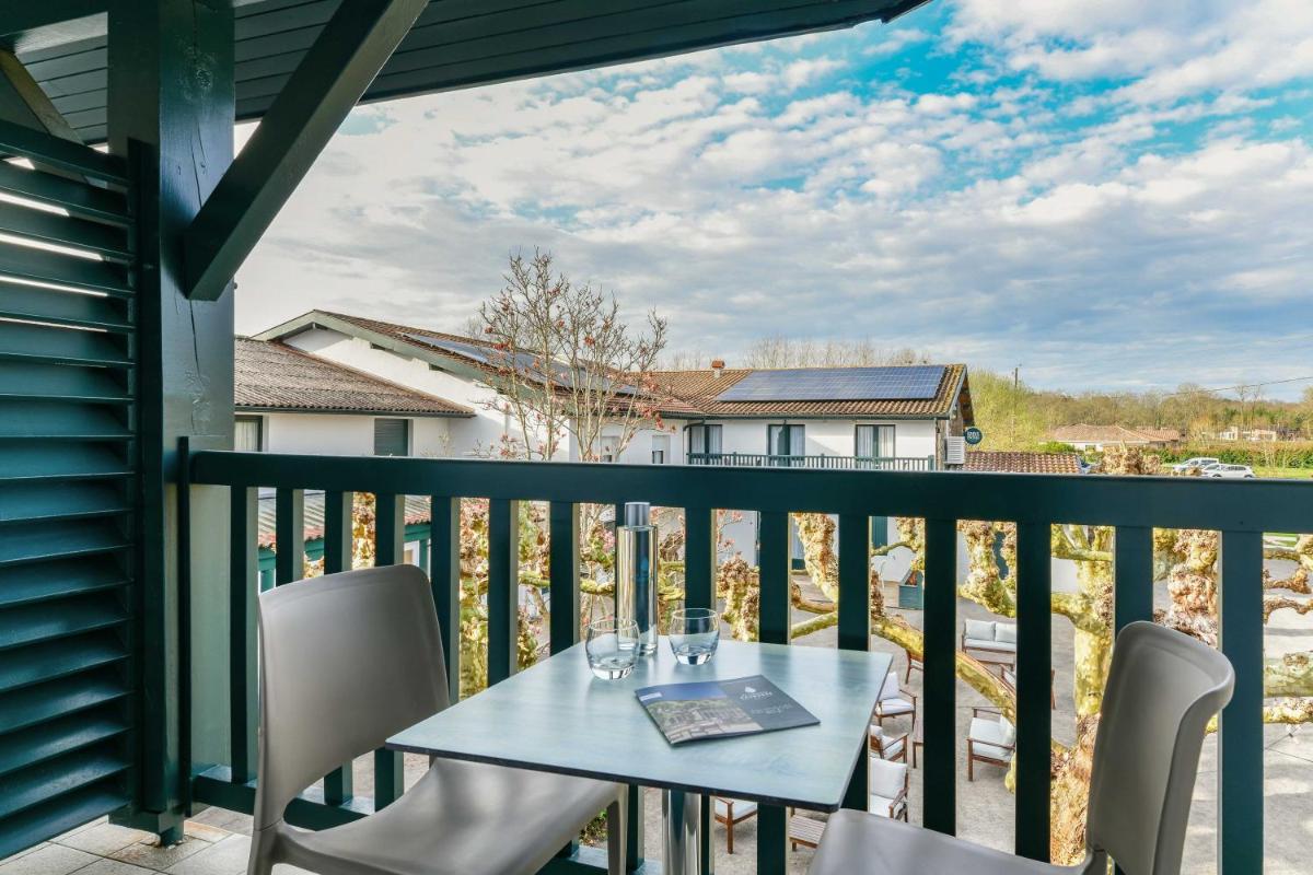 Balcon ou terrasse dans l'établissement Logis Thermal