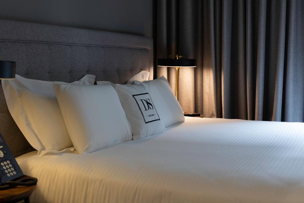 Uma cama ou camas num quarto em DS Hotel Lusopark