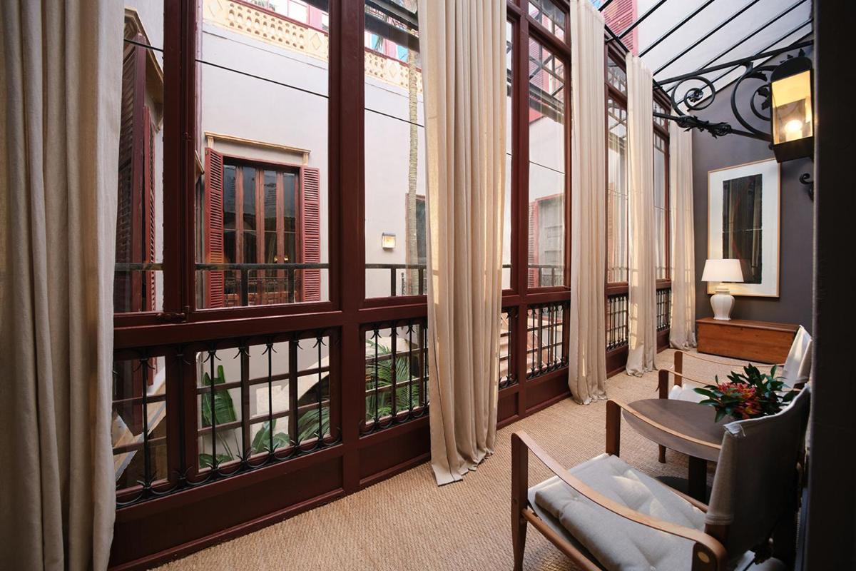Zona de estar de Hotel Can Cera