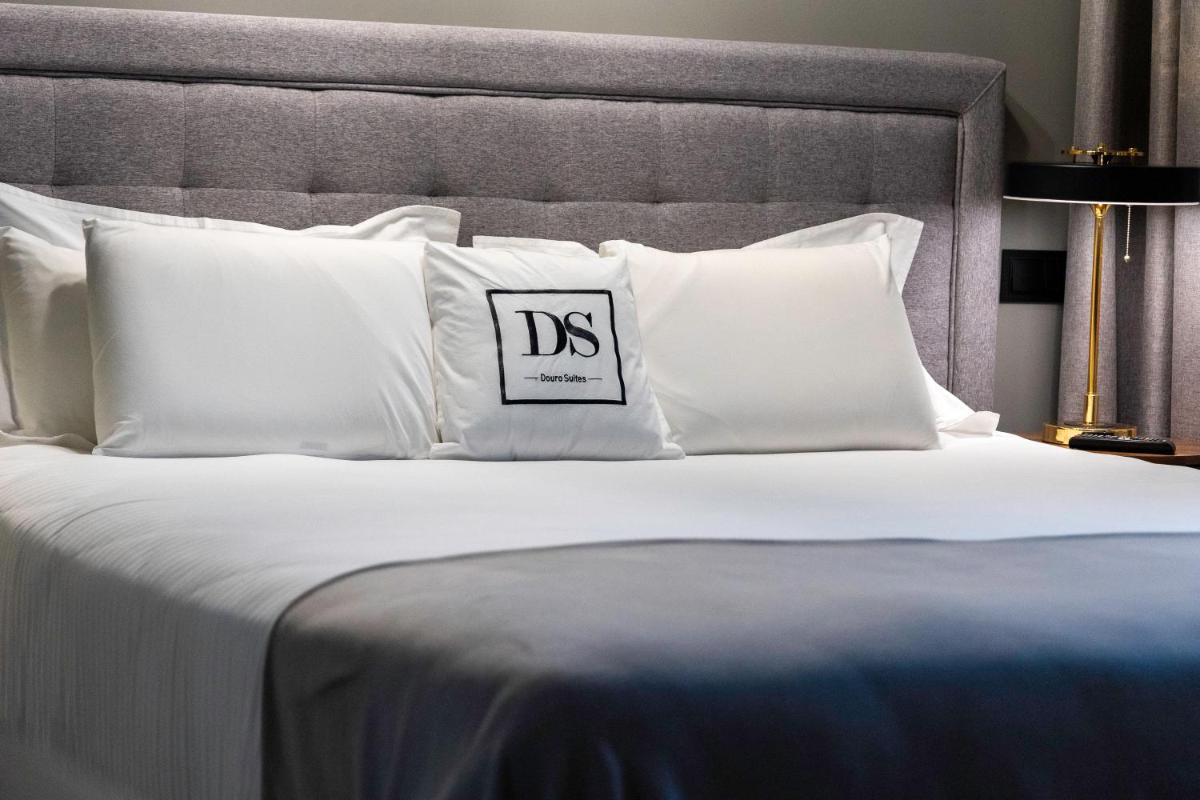 Uma cama ou camas num quarto em DS Hotel Lusopark