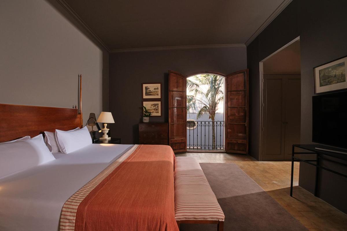 Cama o camas de una habitación en Hotel Can Cera