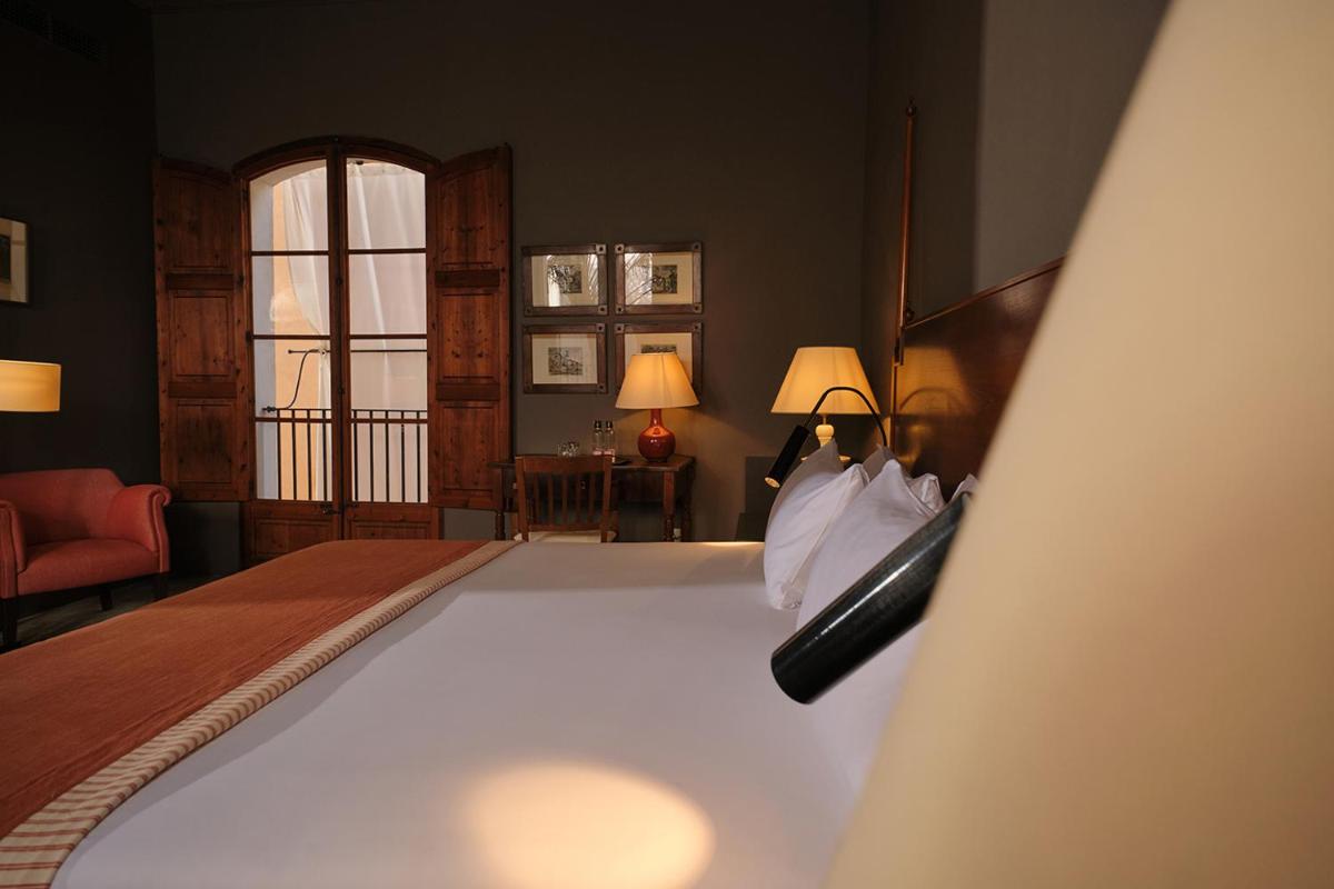 Cama o camas de una habitación en Hotel Can Cera