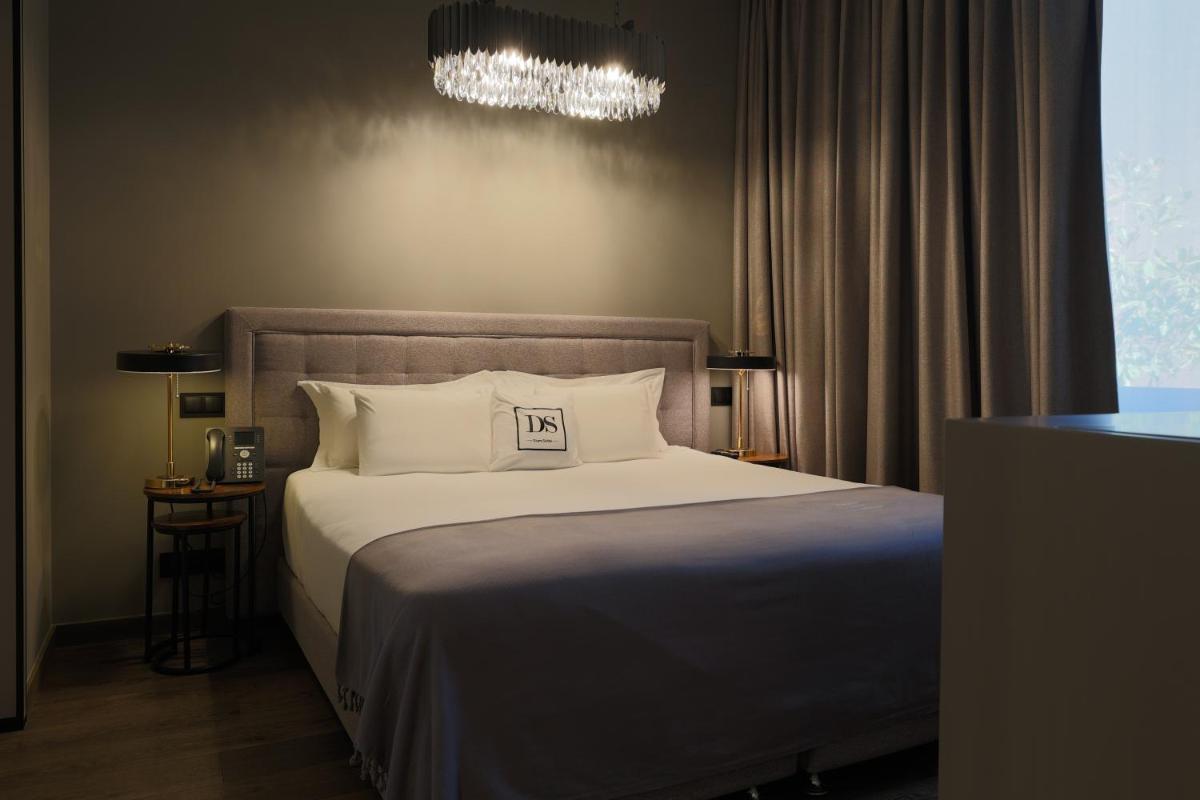Uma cama ou camas num quarto em DS Hotel Lusopark