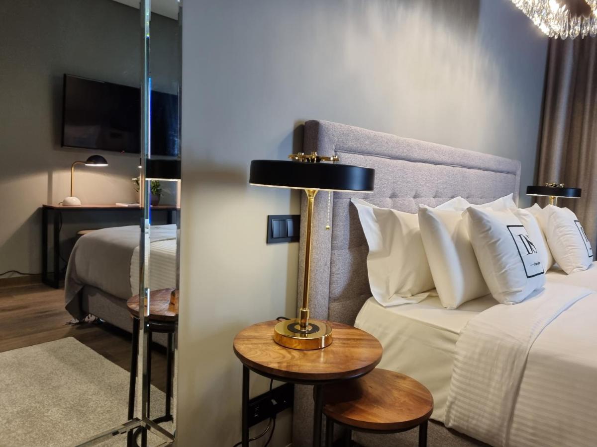 Uma cama ou camas num quarto em DS Hotel Lusopark