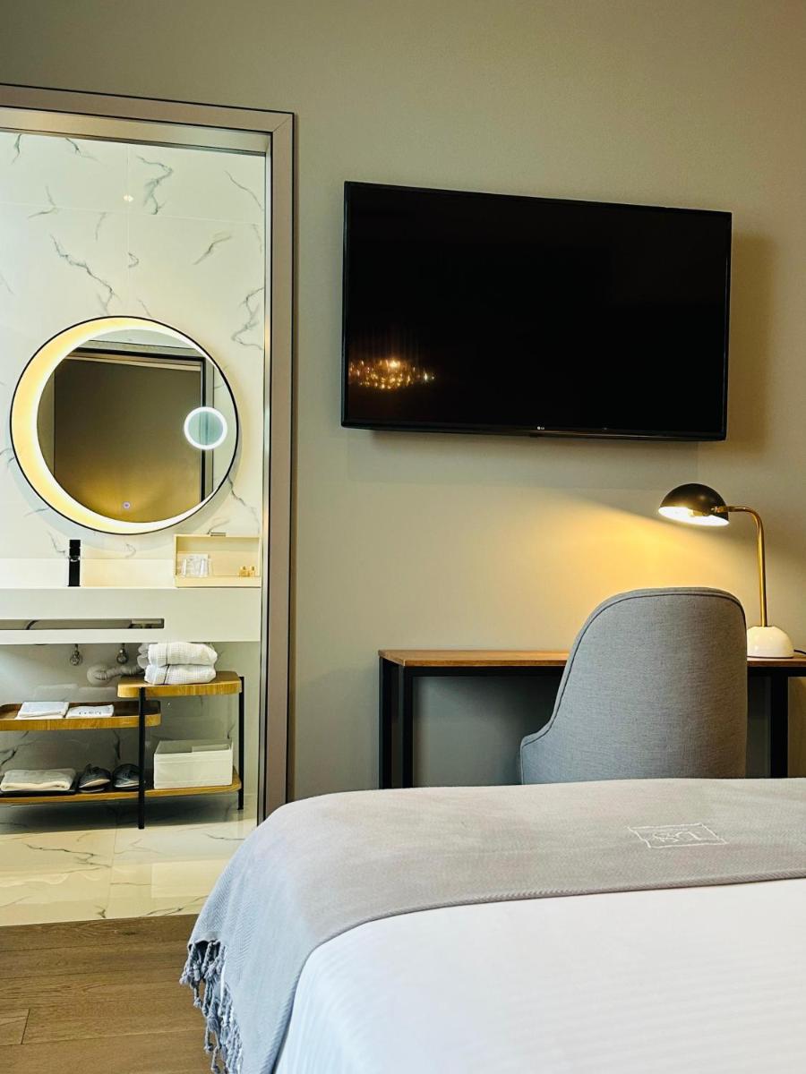 Uma cama ou camas num quarto em DS Hotel Lusopark
