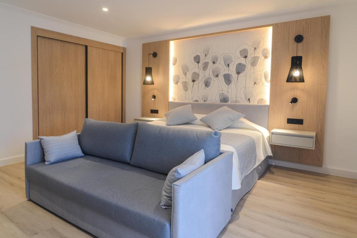 Zona de estar de Hotel Capricho