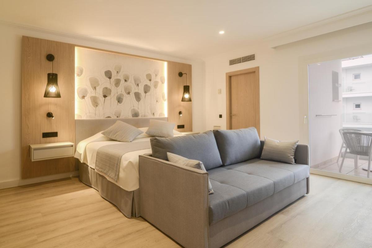 Zona de estar de Hotel Capricho