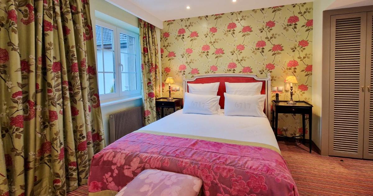 Un ou plusieurs lits dans un hébergement de l'établissement 6717 Nature Hôtel & Spa Le Clos des Délices