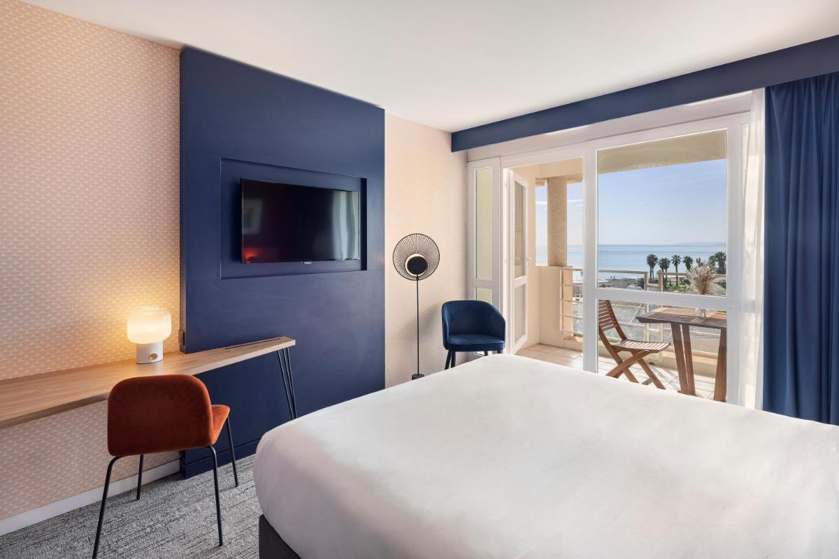 Un ou plusieurs lits dans un hébergement de l'établissement Mercure Thalasso & Spa Port Fréjus