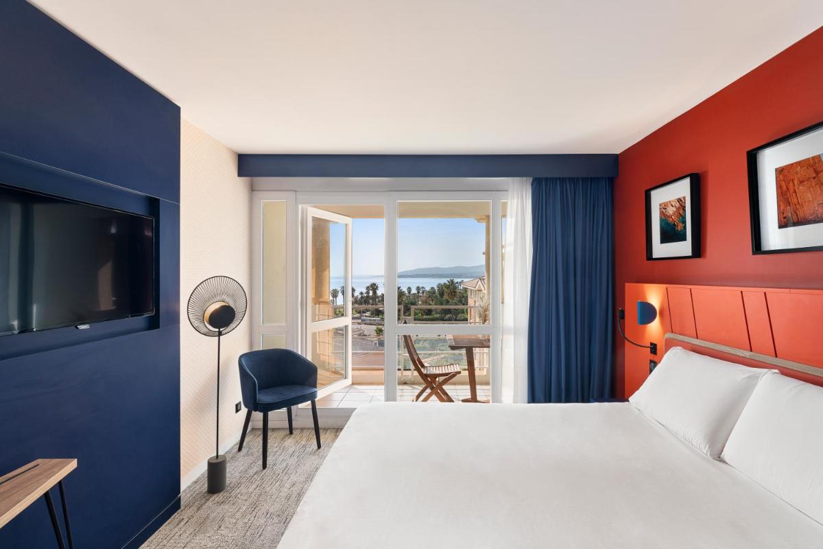 Un ou plusieurs lits dans un hébergement de l'établissement Mercure Thalasso & Spa Port Fréjus