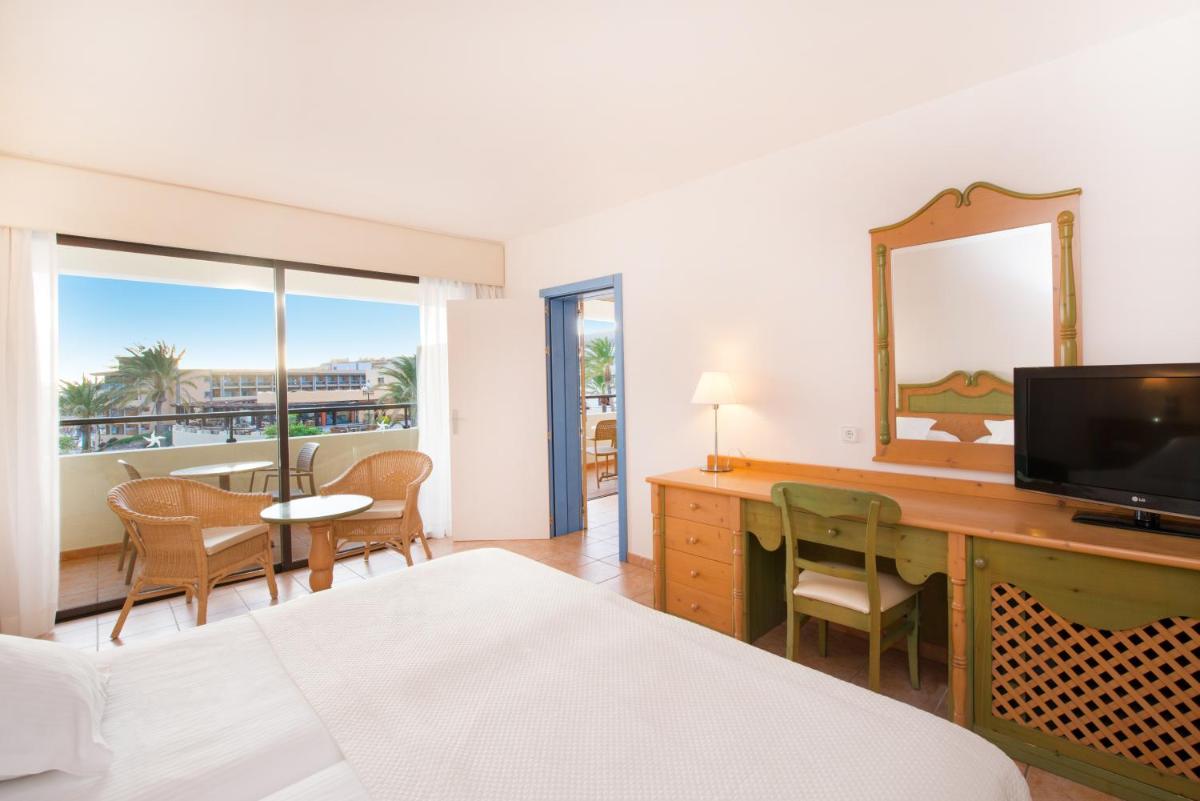 Cama o camas de una habitación en Iberostar Waves Playa Gaviotas All Inclusive