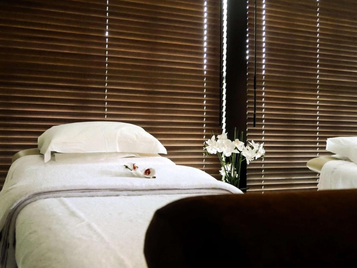 Un ou plusieurs lits dans un hébergement de l'établissement Le Relais de La Malmaison, a member of Radisson Individuals