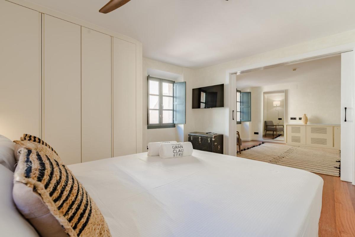 Cama o camas de una habitación en Gran Claustre Boutique Hotel