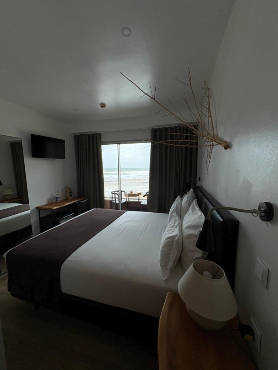 Uma cama ou camas num quarto em Promar - Eco Beach & Spa Hotel