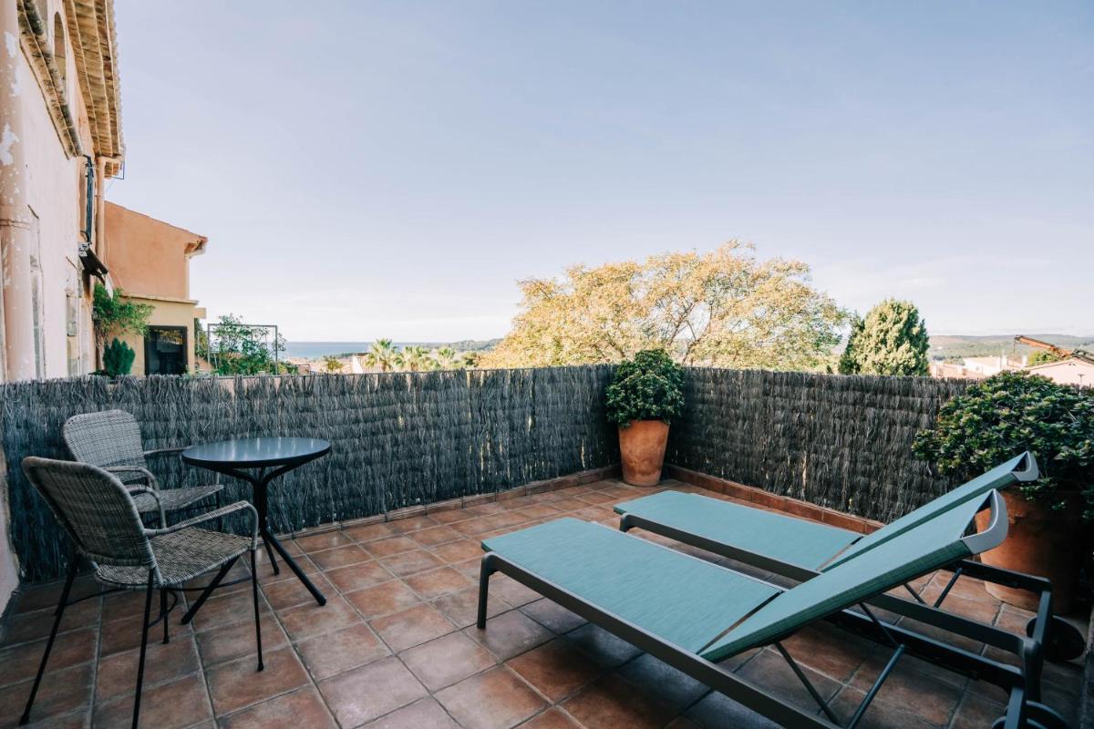 Un balcón o terraza de Gran Claustre Boutique Hotel