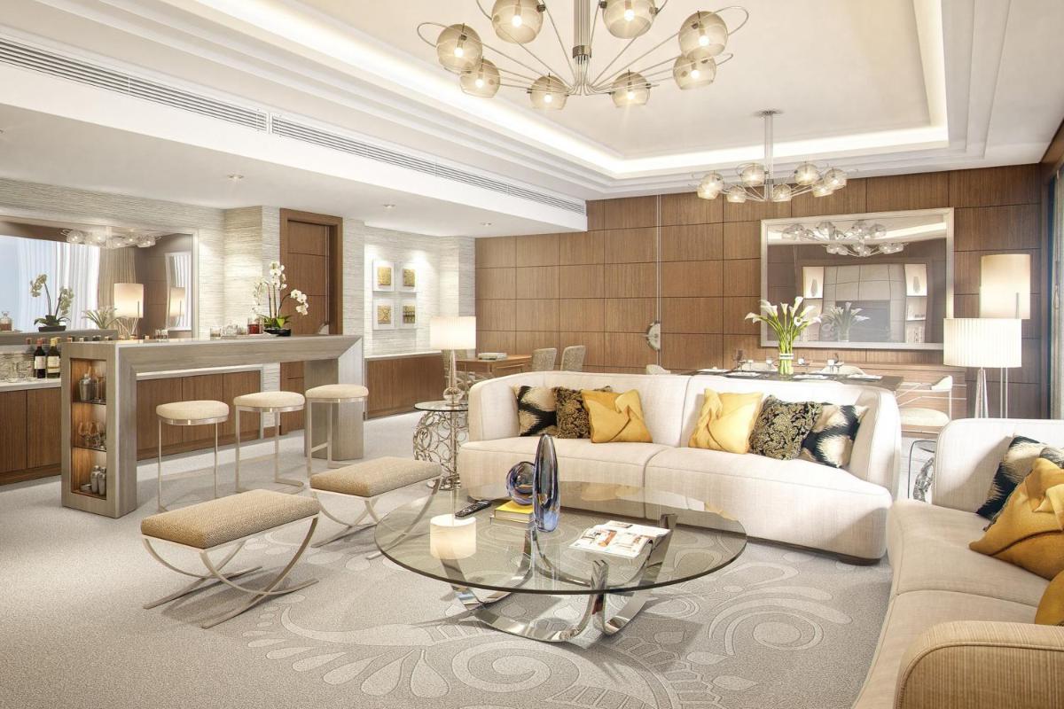 a living room with a couch and a table at The St. Regis Mumbai in Mumbai