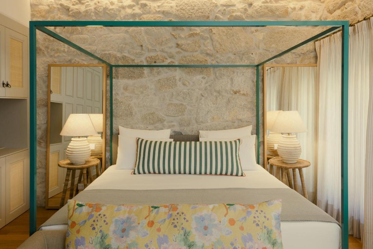 Uma cama ou camas num quarto em Torel Saboaria