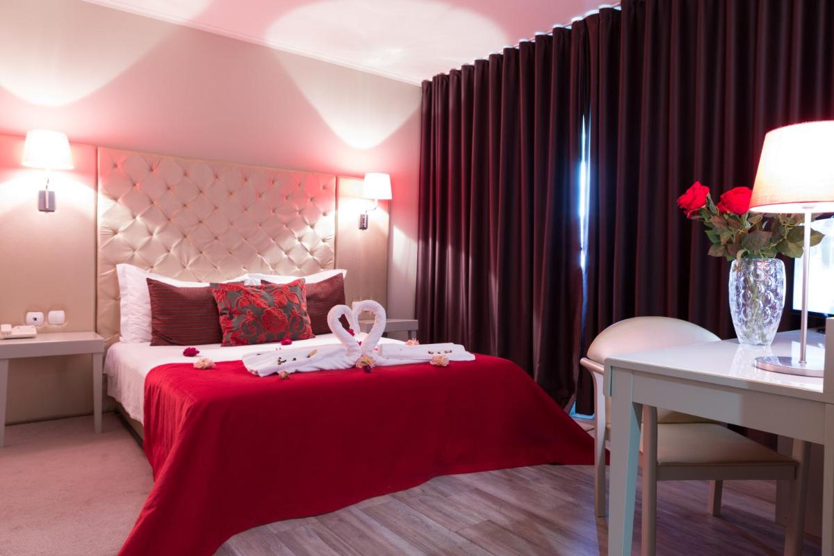 Uma cama ou camas num quarto em Hotel de Ilhavo Plaza & Spa