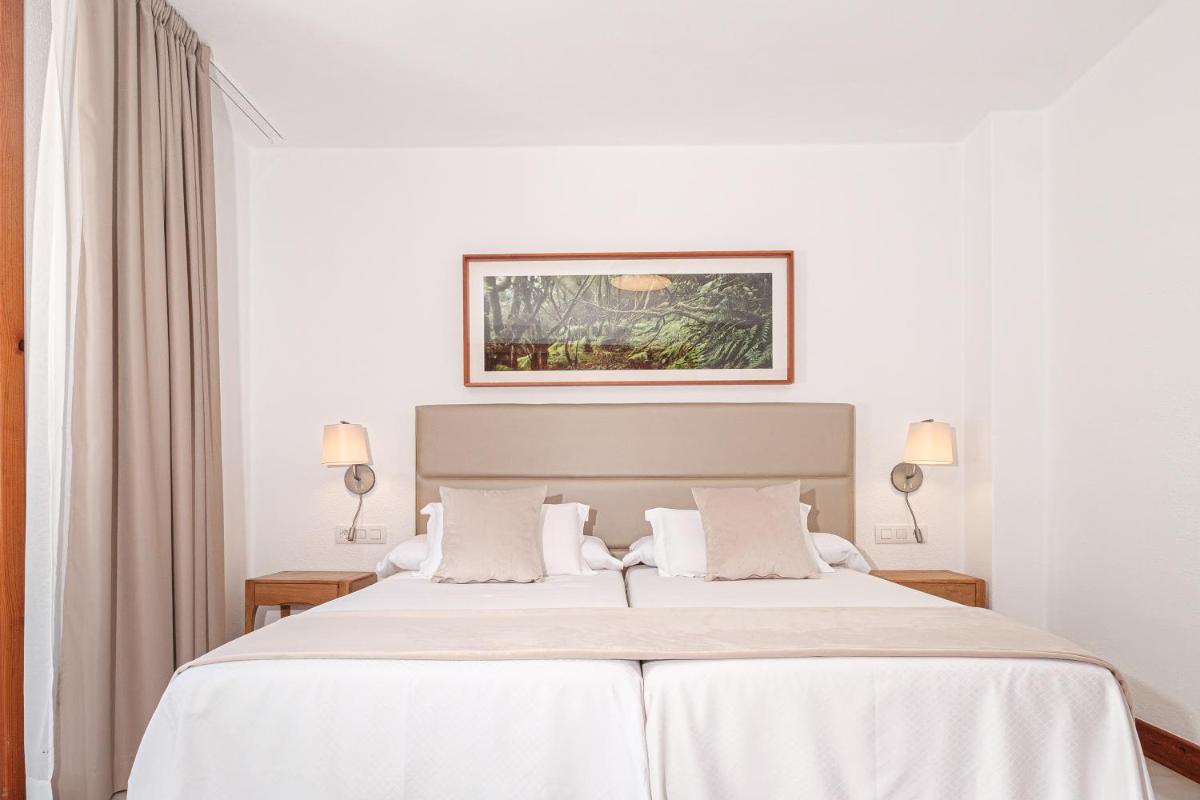 Cama o camas de una habitación en Parque Santiago III Official