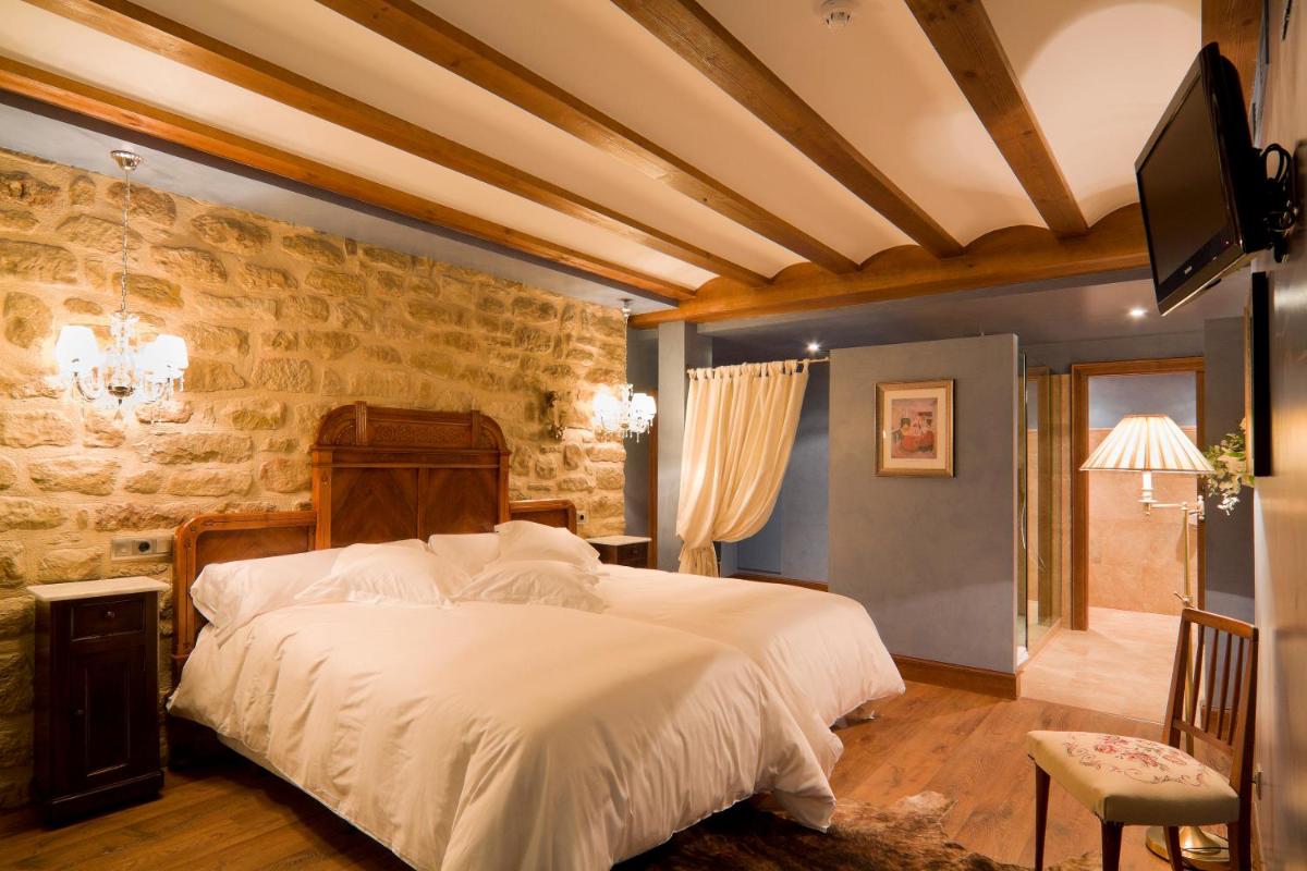 Cama o camas de una habitación en Hospederia de los Parajes