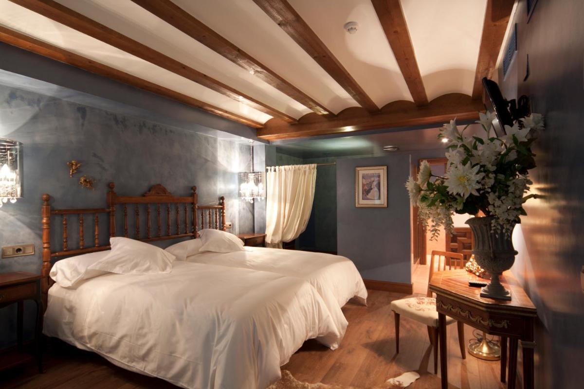 Cama o camas de una habitación en Hospederia de los Parajes