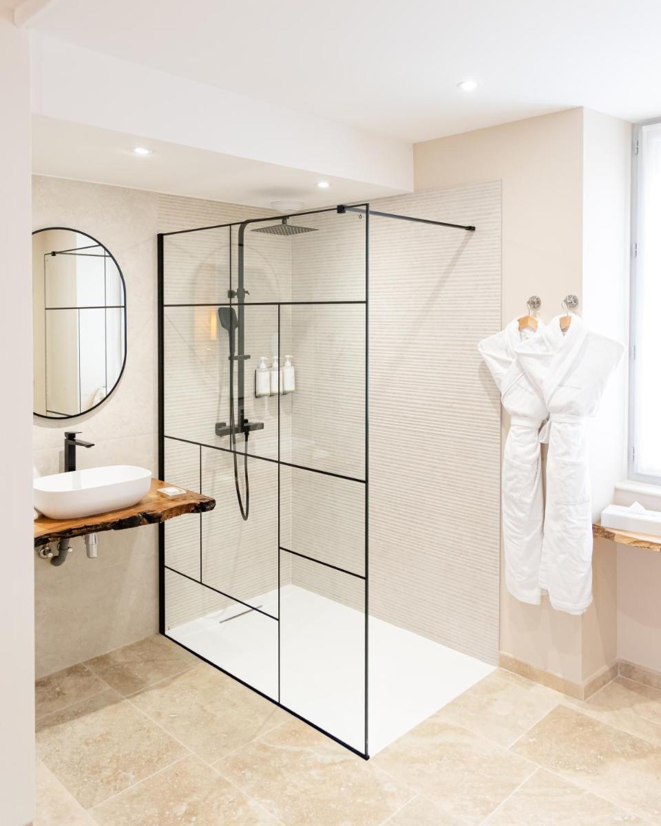 Salle de bains dans l'établissement Maison Doucet - Relais & Châteaux