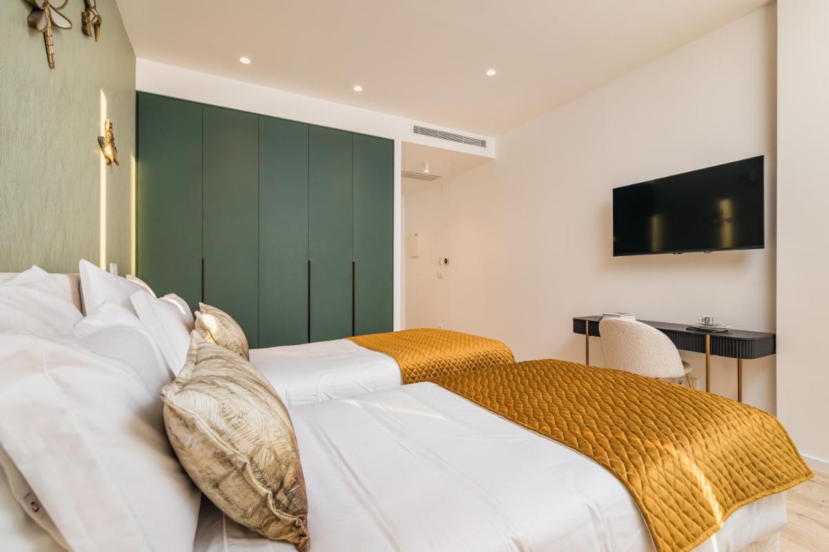Uma cama ou camas num quarto em Haven Nature Hotel & Villas